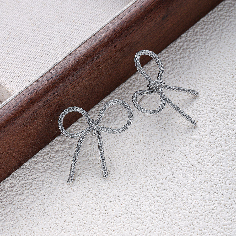 Silver Whisper Bow Earrings